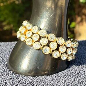 Rhinestone bracelet set in heavy gold tone metal, bezel set, super sparkly